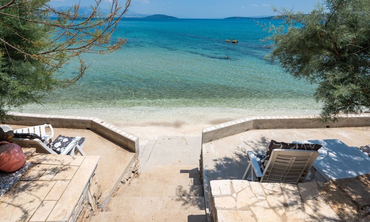 Trogir Villa | Beachfront villa Mihovil with direct beach access, garden, pool and mooring