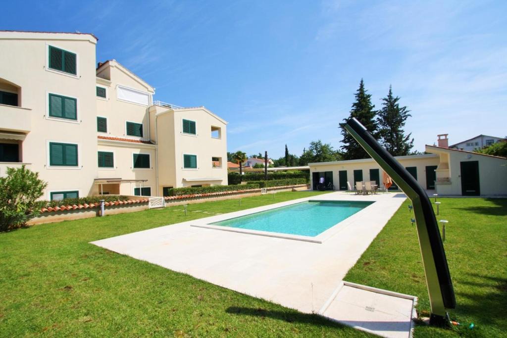 Cancini Apartment | One Bedroom Apartment Bonsai with shared Pool