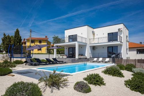 Orbanici Villa | Villa Angie near Pula for 10 persons with private heated pool & kids playground
