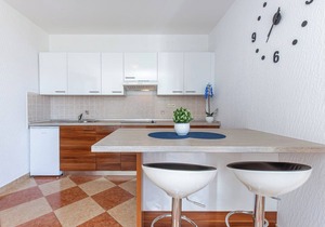 Holiday apartment with sea view and pool
