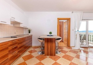 Holiday apartment with sea view and pool