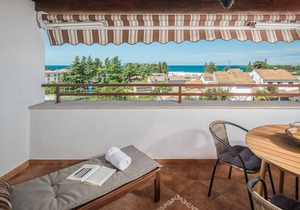 Popular fully equipped modern one bedroom apartment in a top location in Porec near the beach and with sea view
