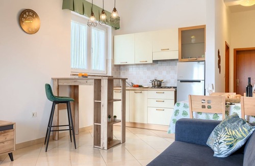 Galizana Apartment | Affordable apartment with stylish interior, baby crib, playground