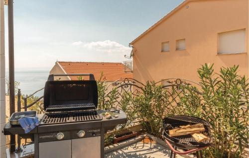 Bratus Apartment | Beach Front Apartment In Krvavica With Wifi