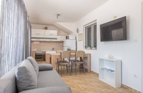 Trogir Villa | Beachfront villa Mihovil with direct beach access, garden, pool and mooring