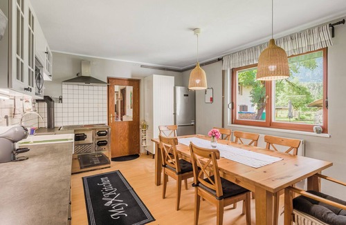Cezsoca House | Charming house in Čezsoča near Bovec with mountain views. Sleeps up to 7 guests in 3 bedrooms and sofa bed. First-floor apartment close to the Soča River, shops, hiking trails, cycling routes and outdoor adventures.