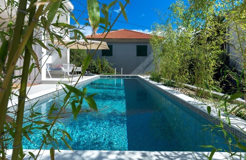 Dugi Rat Villa | Green and private with a luxury style