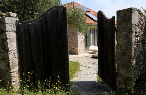 Hvar House | Historic Seafront Stone Retreat in Peaceful St. Anthony's Bay