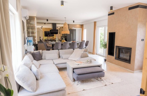 Barilovic House | Luxurious riverside retreat with pool, sauna, jacuzzi, and panoramic nature views.