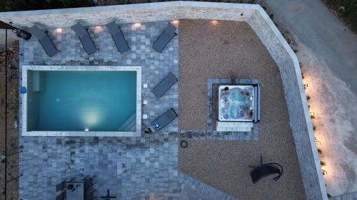 Gostinjac Villa | Modern villa with heated pool, whirpool in quiet area - by Traveler tourist agency Krk ID 2180