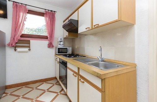 Tkon Apartment | One-Bedroom Apartment with Mountain View, Wi-Fi, and Air Conditioning