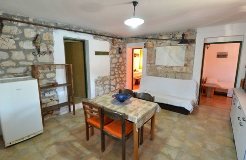 Kornati House | Steinhaus am Meer mit überdachter Terrasse als p by Interhome