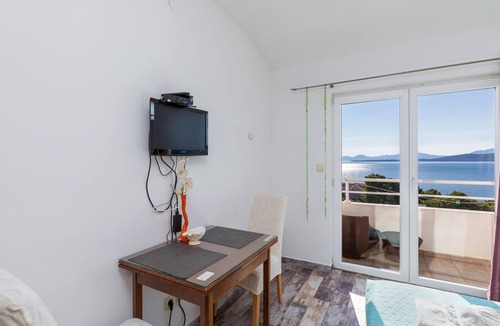 Igrane Apartment | Studio flat with balcony and sea view Igrane, Makarska (AS-22690-c)