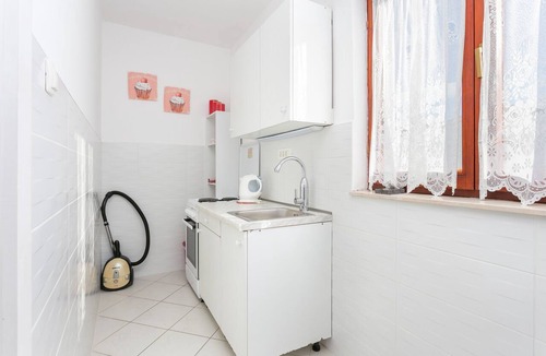 Seget Vranjica Apartment | Two bedroom apartment with terrace and sea view Seget Vranjica, Trogir (A-1038-a)