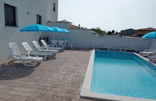 Murine Apartment | Two bedroom apartment with a swimming pool Murine, Umag (A-27509-b)