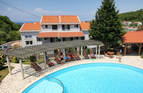 Kampor Apartment | Two bedroom apartment with a swimming pool by the beach Kampor, Rab (A-3213-e)