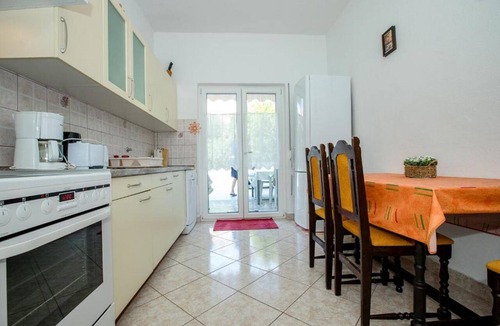 Rab Apartment | Vacation Home Daisy with Private Terrace, Wi-Fi and Air Conditioning