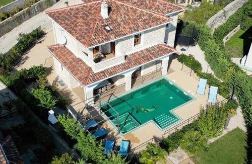 Kornic Villa | Villa NOAH - 4 bedrooms, 4 bathrooms, heated inside pool, jacuzzi, sauna, gym