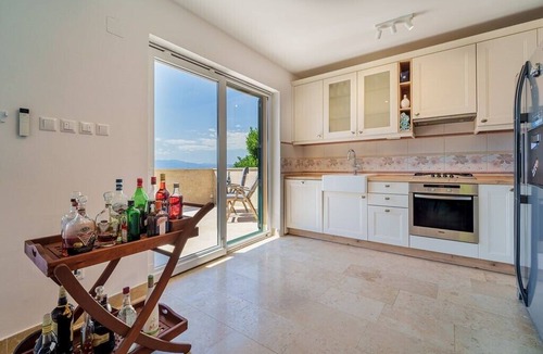 Municipality of Omisalj Villa | Villa with Heated Pool, Sea View, Jacuzzi & Total Privacy in Omišalj