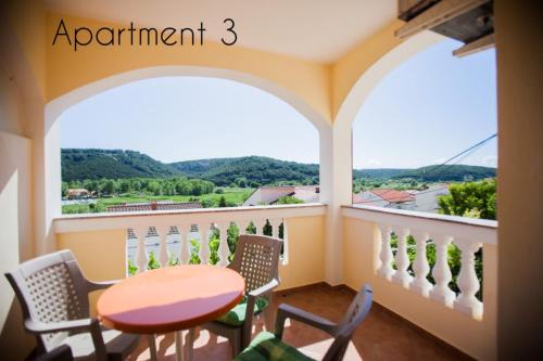 Apartment in Lopar with balcony, air conditioning, W-LAN, washing machine (186-3)