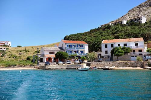 Apartments by the sea Metajna, Pag - 10405 in Zubovići