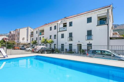 Apartments with swimming pool Podstrana, Split - 22897 in Podstrana