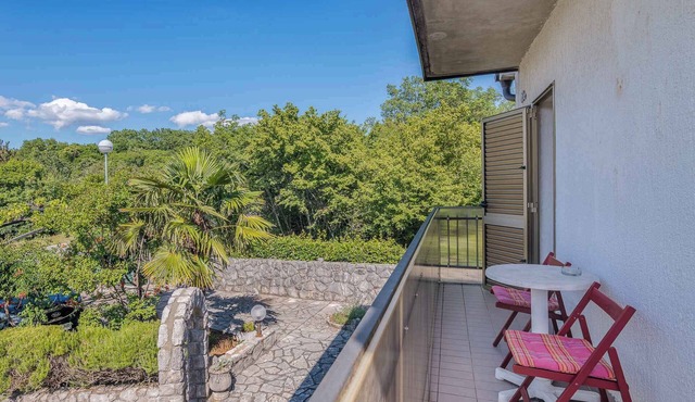 Holiday apartment with balcony and air conditioning