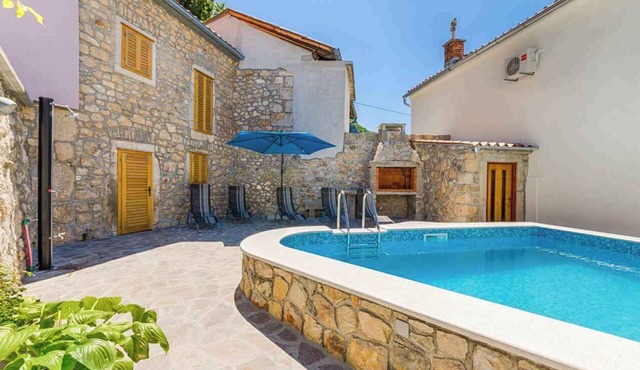 Holiday home with pool, sun terrace and barbecue