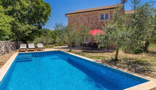 Holiday house ALYSSA with pool on Krk island, 3km from sand beach