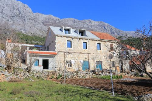 Holiday house with a parking space Zivogisce - Strnj - Zivogosce - Strnj, Makarska - 18025 in Živogošće