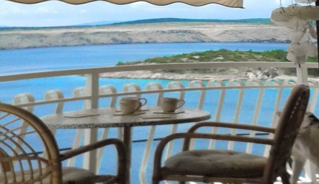 House with sea view above the beach
