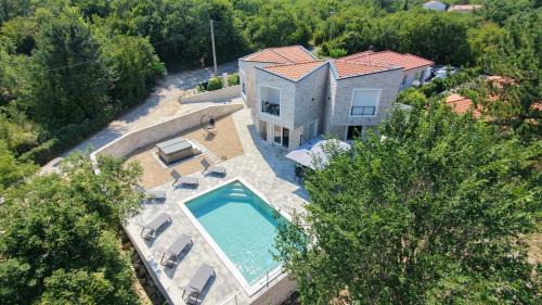 Modern villa with heated pool, whirpool in quiet area - by Traveler tourist agency Krk ID 2180