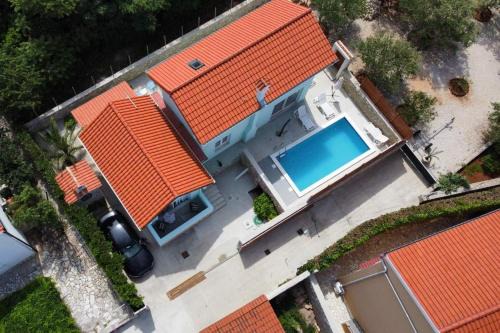 Seaside house with a swimming pool Vinjerac, Zadar - 9689 in Vinjerac