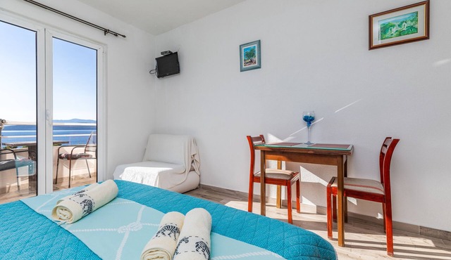 Studio flat with balcony and sea view Igrane, Makarska (AS-22690-b) in Igrane