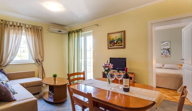 Two bedroom apartment with terrace and sea view Mali Lošinj (A-2505-c)