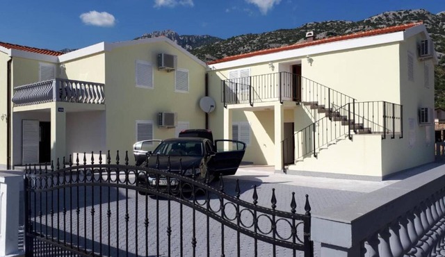 Two Bedroom Apartment with Balcony and Garden View