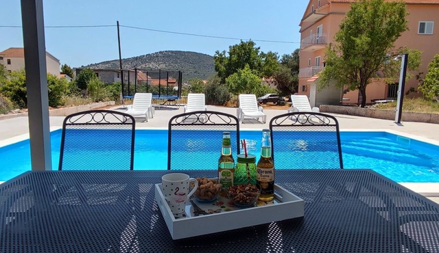 Two bedroom apartment with a swimming pool Vinišće, Trogir (A-12676-a) in Vinišce