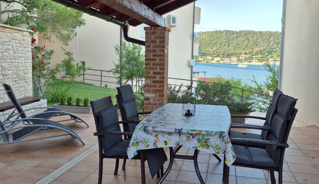Two bedroom apartment with terrace and sea view Supetarska Draga - Donja, Rab (A-25344-b)