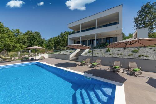 Villa Althea for 8 persons near Labin with 35 m2 heated pool, kids playground & large garden in Ružići