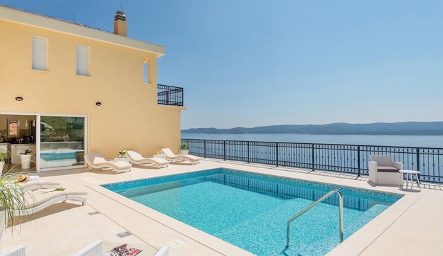Villa Sun Palace is a 5-bedroom villa with amazing sea views in Mimice