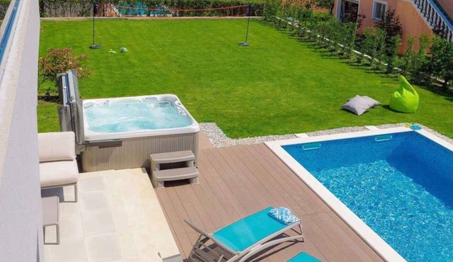 Villa with pool, jacuzzi and playing field in Rogovići