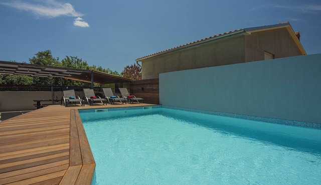 Villa with private pool, playground, sun terrace, WLAN