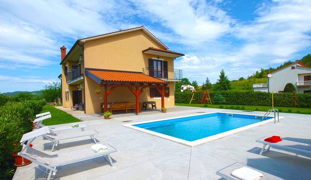 Villa with swimming pool and playground