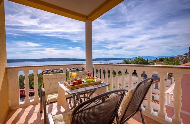 Holiday apartment with sea view and pool
