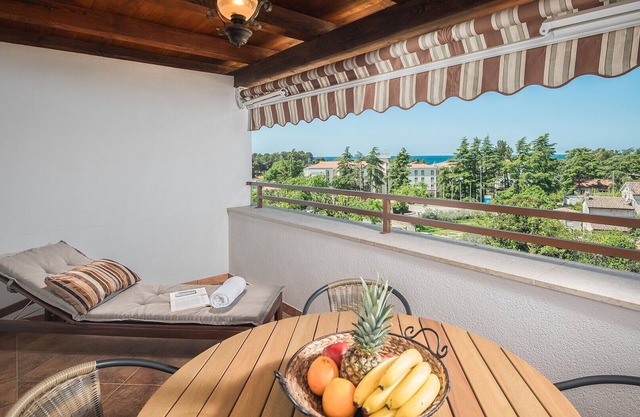 Popular fully equipped modern one bedroom apartment in a top location in Porec near the beach and with sea view