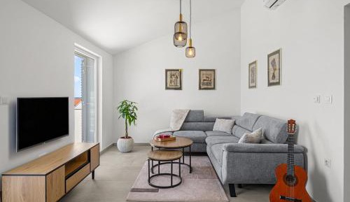One-Bedroom Apartment with Balcony and City View