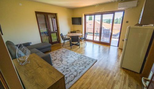Two-Bedroom Apartment with Balcony and Sea View