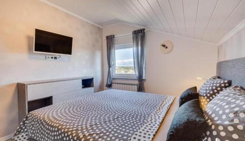 Three-Bedroom Apartment with Balcony