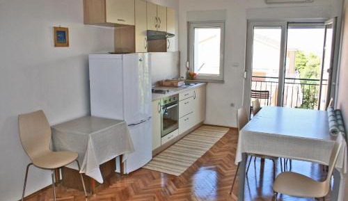 Two-Bedroom Apartment with Balcony and Sea View