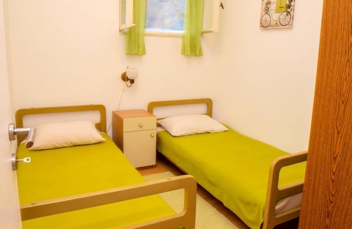 Postira Apartment | Two bedroom apartment with terrace and sea view Postira, Brač (A-21308-a)